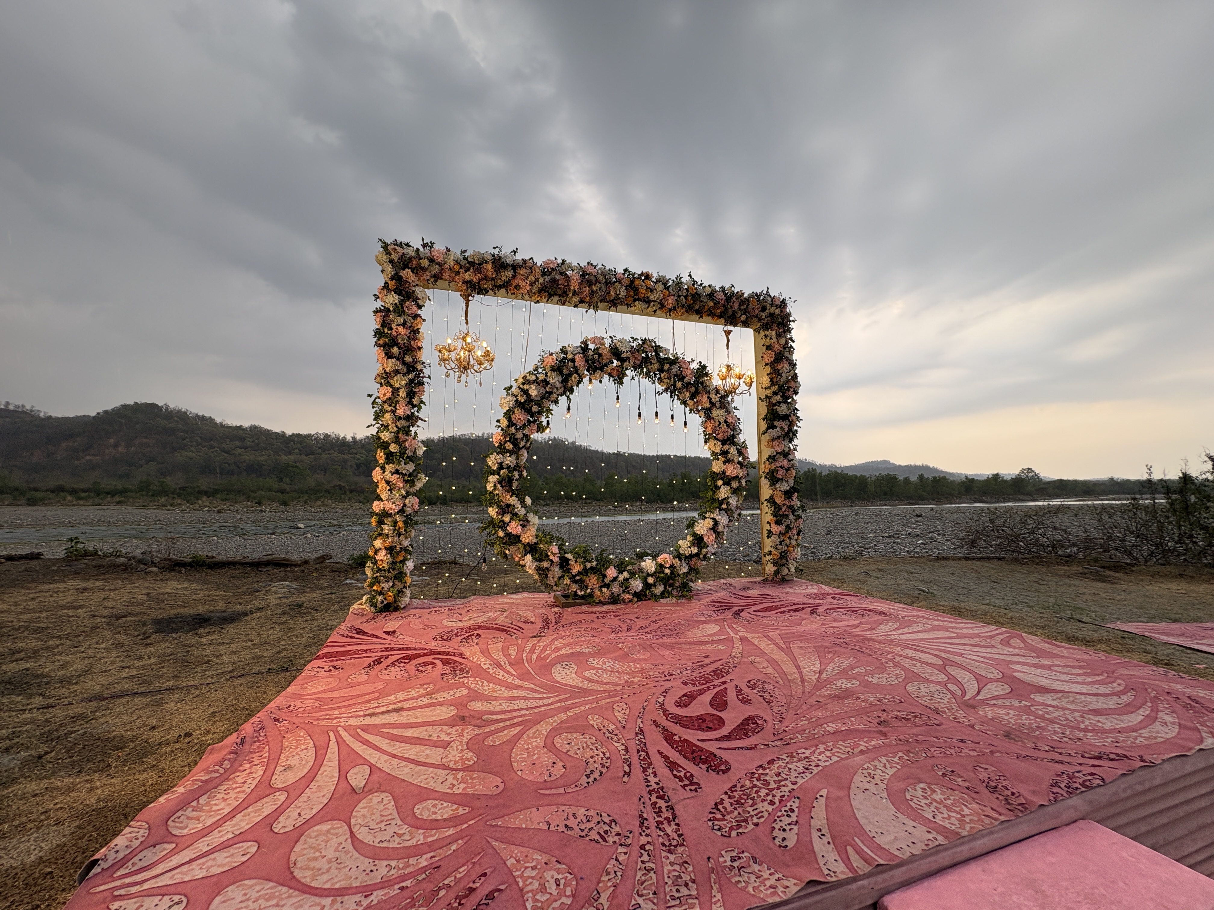 Riverside wedding photo at Corbett Wild Resort